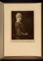 [Seated woman]