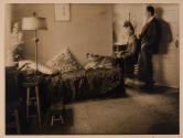 [Two men in house]