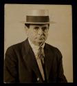 [Elias Goldensky wearing boater hat]