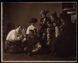 [Elias Goldensky and wife, Jack Garo and wife and others in studio with toys]