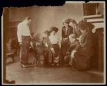 [Elias Goldensky and wife, Jack Garo and wife and others in studio with toys]
