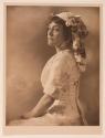 [Annette Kellerman in high fashion daytime dress]