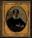 [A woman in dress]