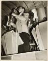 [Saxophone player]