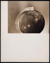 [Study: Dime rolling along circumference of globe]