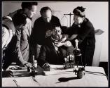 [Adveritsing for N.W. Ayer Agency: actor posed as scientist Louis Pasteur being directed by Victor Keppler and three others]