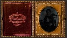 [Boy, seated]