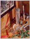 [Union Carbide Corporation, Electronet Review, christmas cover, still life with knives, rod and watch]