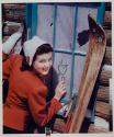 [Woman's Home Companion, woman drawing on snowy window]
