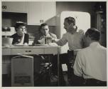 [Victor Keppler in studio kitchen preparing for Sealtest Ice Cream photo shoot]