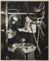 [Sealtest Ice Cream: Victor Keppler and woman setting up fruit for a photograph]