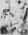 [laboratory scene with flasks and beakers]