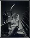 [Corning Glass, man etching vase]
