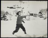 [boy throwing snowball]