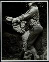 [two soldiers in hand to hand combat]