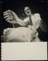 [man with ice pick and ice block]