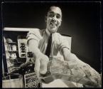[Green River Whiskey [?], man with ice cube tray]