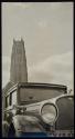 [Hudson 8 [automobile] and cathedral tower]