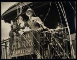 [New York Central Railroad, bride and groom on observation platform of train]