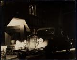 [car in front of house at night]