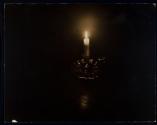 [candle in darkness]