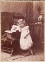 [Girl with photo albums]