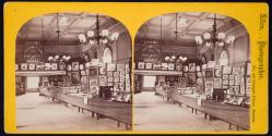 [Interior of Wing's gallery, showing framed photographs]