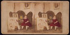 [Daughter of Daniel W. Briggs ( Genevieve or Florence) posed with a variety of framed objects and figures, including a stereo viewer]
