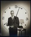 [man behind timer]