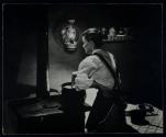 [Community Chest, woman in old fashioned kitchen]