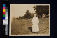 ['Neighbour Maggie' standing on grass]