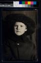 [Katherine Rich in a fur cap]