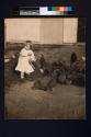 [Harriet Rich feeding chickens]