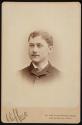 [Young man with moustache]