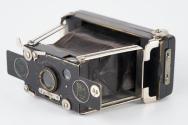 Ensignette, focusing lens