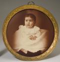 [Baby girl wearing a gold ring]