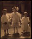 [Portrait of three children]