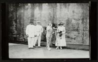 Donald C. Thompson, making pictures with his camera at Bilibid prison, Manila
