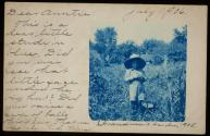 [Child in garden]