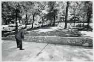 In the front yard of his Atlanta home, Dr, King takes time out for a game of catch with his sons