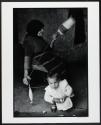 Grandmother carding wool, Crete, Greece