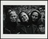 Women at graveside, Pirgos Dirou, Mani, Greece