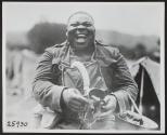 "Big Nims" with a gas mask. 366th Infantry Regiment, Third Battalion. Ainvelle, Voges, France