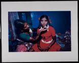 Pockmarked Girl Being Made Up