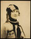 [Model (Ruth Malcomson) in a scarf and hat]