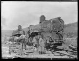 Engine buried in Drift. Thirty freight locomotives from destroyed round house at Conemaugh, rolled down the Conemaugh River, totally destroyed and buried in drift.