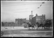 [Horse-drawn hackney coach crossing bridge, Rochester New York]