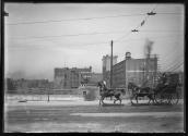 [Horse-drawn hackney coach crossing bridge, Rochester New York]