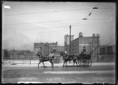 [Horse-drawn hackney coach crossing bridge, Rochester New York]