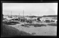 [Items on beach, lake]
